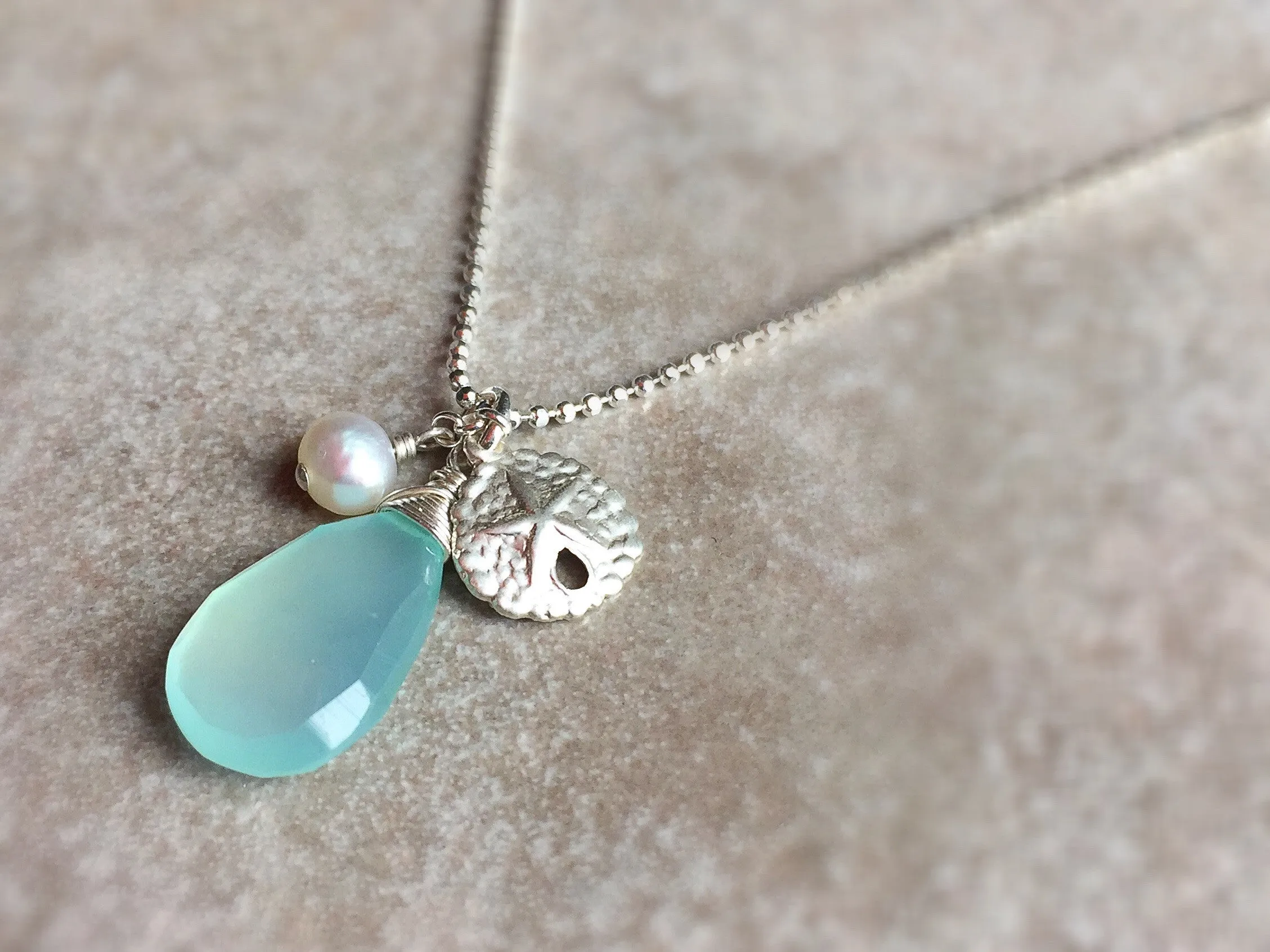 Aqua chalcedony sand dollar pendant necklace